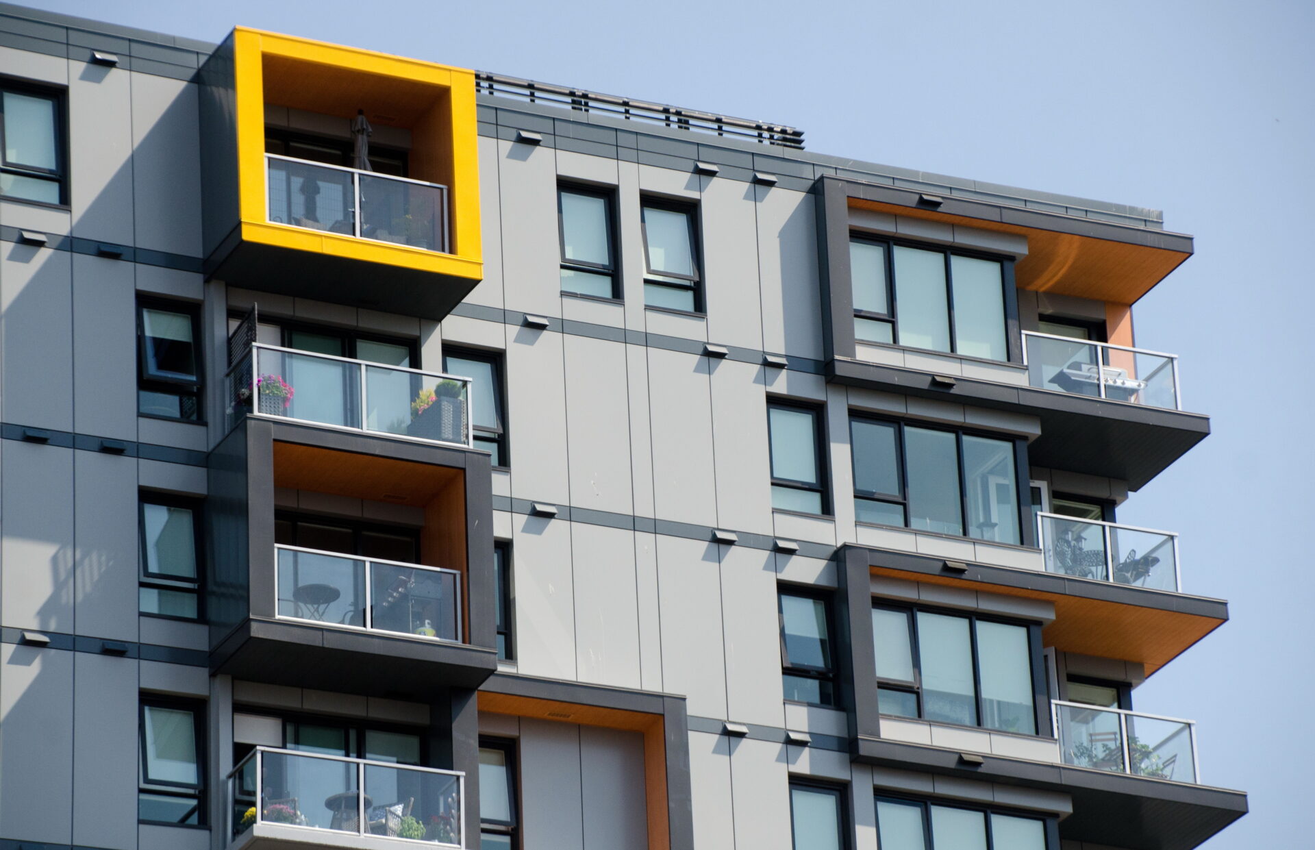 Yellow highlights in exterior of a condo building in Victoria downtown